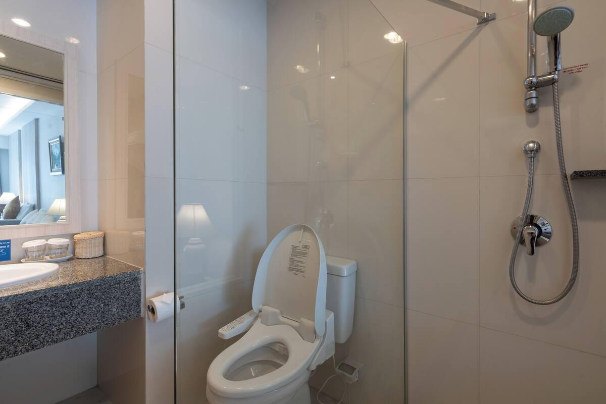 deluxe studio | bathroom | free toiletries, hair dryer, bathrobes, slippers