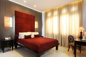 Suite familiare, 2 camere da letto | Una scrivania, postazione laptop, insonorizzazione