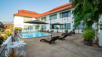 Outdoor pool, open 9:30 AM to 8:00 PM, pool umbrellas, sun loungers