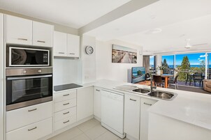 2 Bedroom Apartment | Private kitchen | Full-size fridge, microwave, oven, stovetop