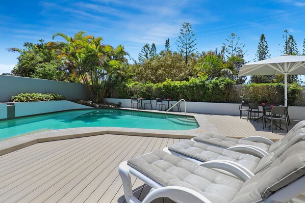 Outdoor pool, pool umbrellas, pool loungers