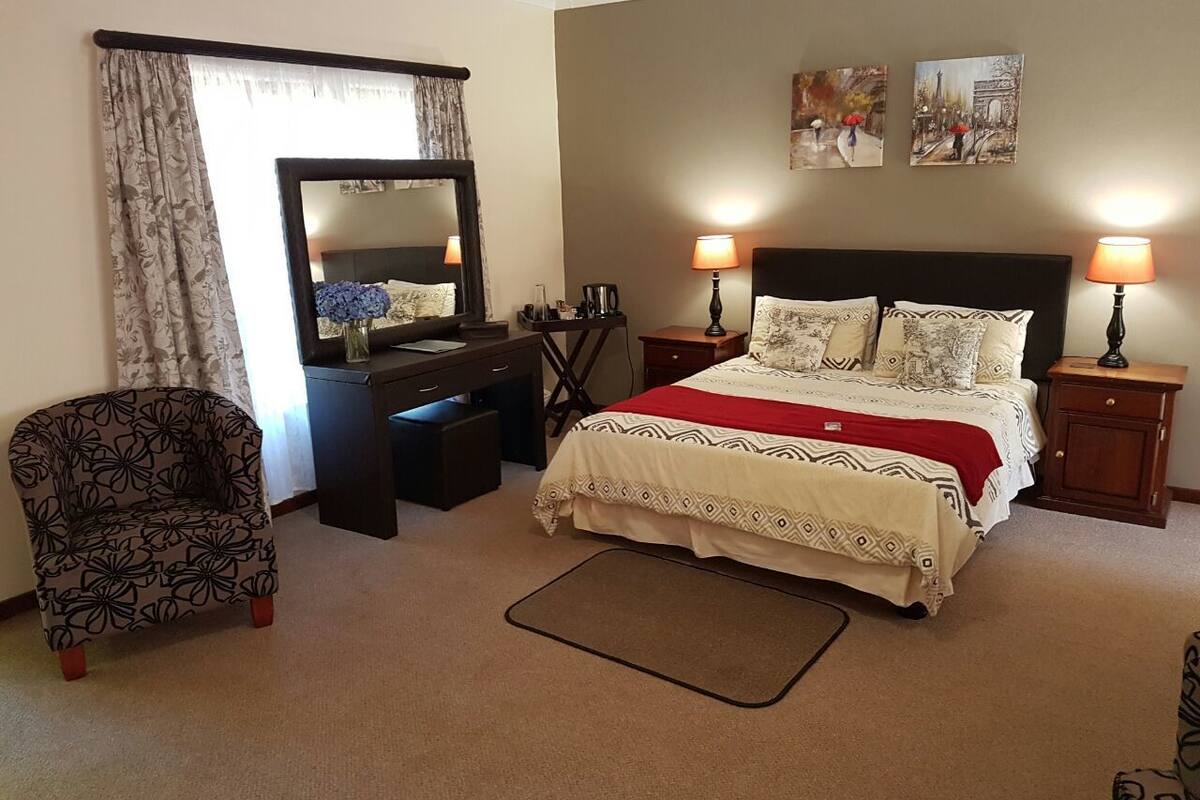 Family Room | Premium bedding, down comforters, in-room safe, desk