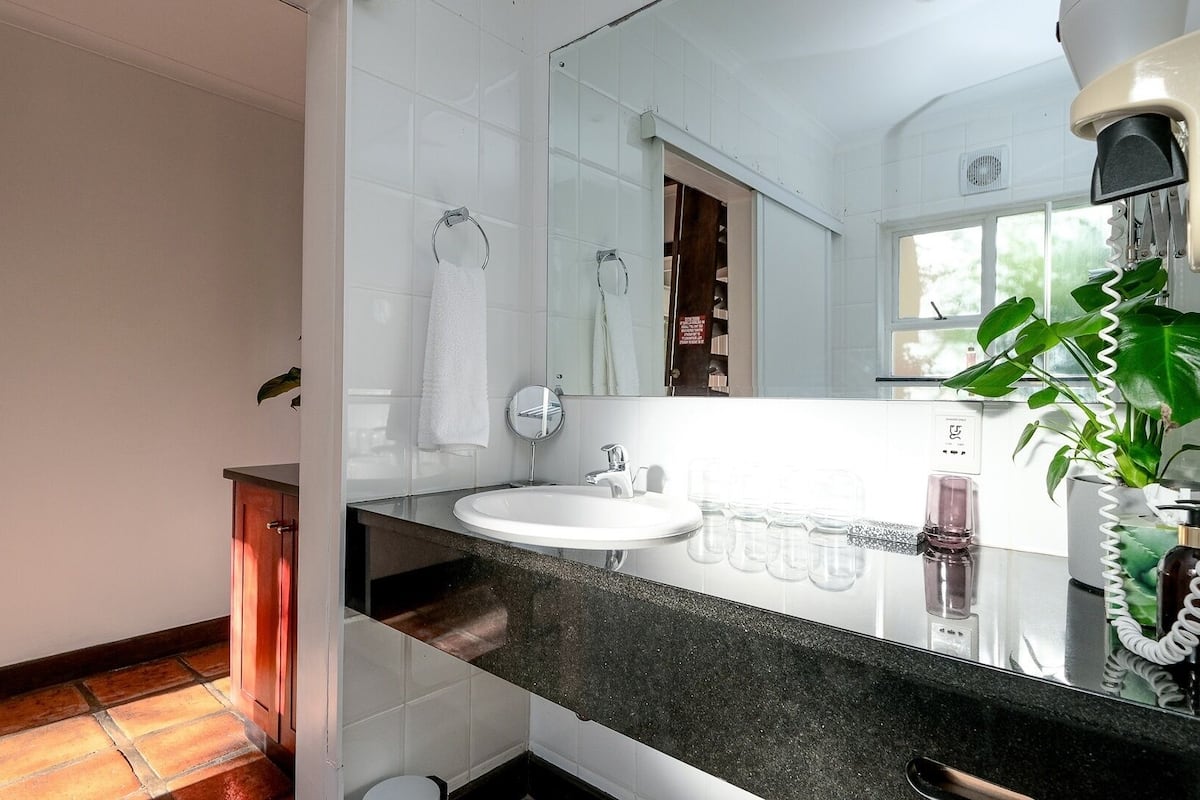 family double en-suite with children’s loft room, accessible, ocean view | bathroom | hair dryer, dressing gowns, towels, soap