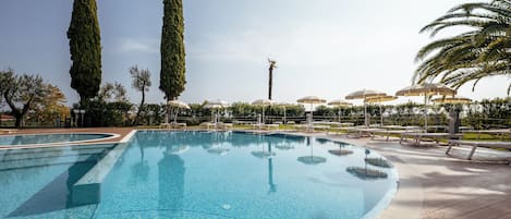 Seasonal outdoor pool, pool umbrellas, pool loungers