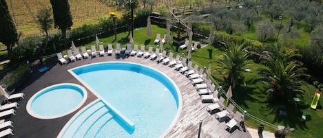 Seasonal outdoor pool, pool umbrellas, sun loungers
