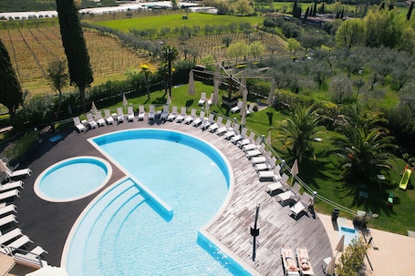 Seasonal outdoor pool, pool umbrellas, pool loungers. Villa Luisa Resort & Luxury Apartments