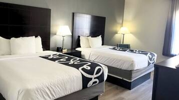 Premium bedding, down comforters, pillowtop beds, in-room safe