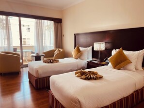 Deluxe Twin Room, 1 Bedroom | Minibar, in-room safe, desk, laptop workspace - Inter Luxury Hotel (Addis Ababa)
