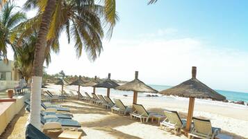 Private beach, sun-loungers, beach volleyball