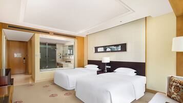 Hypo-allergenic bedding, down comforters, minibar, in-room safe