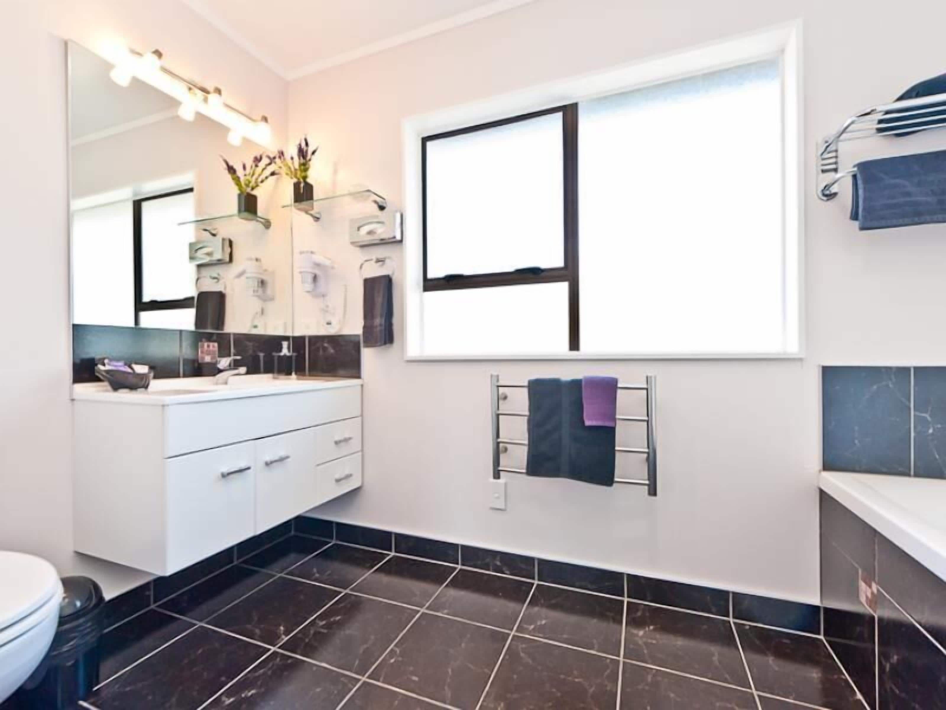 basic studio, 1 king bed | bathroom | free toiletries, hair dryer, towels