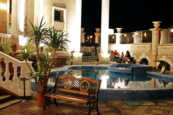 Seasonal outdoor pool, pool loungers