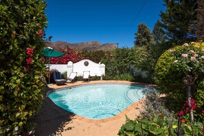 Outdoor pool, pool umbrellas, pool loungers