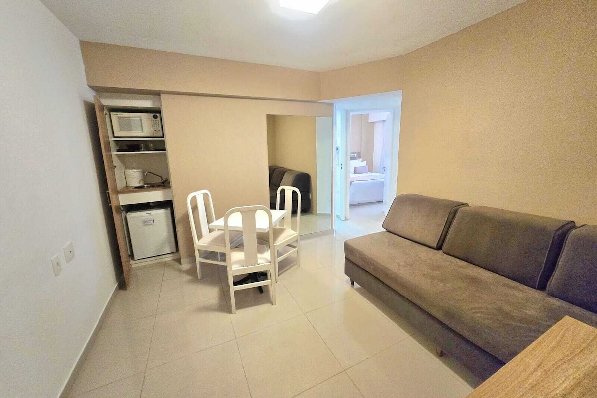 Family Suite | Living area | 40-inch flat-screen TV with cable channels, TV