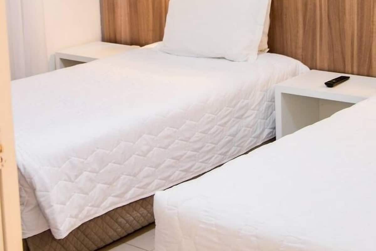 Premium Triple Room | 1 bedroom, minibar, in-room safe, blackout drapes