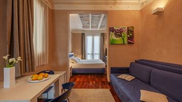 Familiestudio, 1 soverom | Dundyner, minibar, safe på rommet og individuelt dekorert