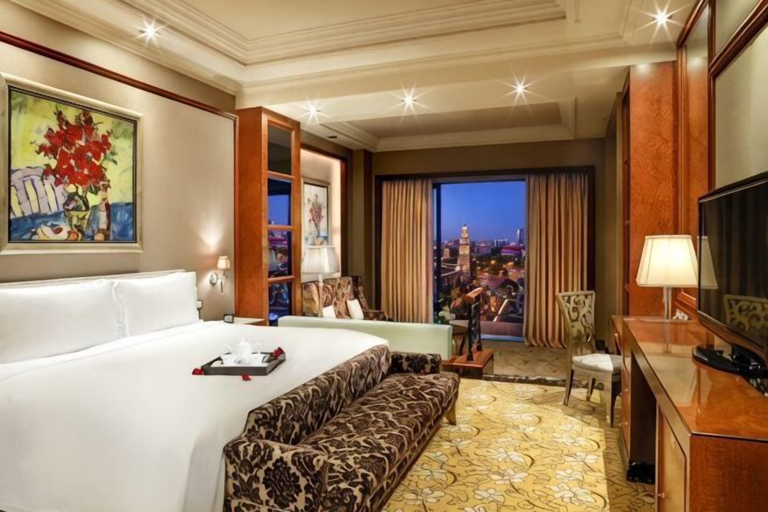 Luxe beddengoed, donsdekens, een minibar, een kluis op de kamer