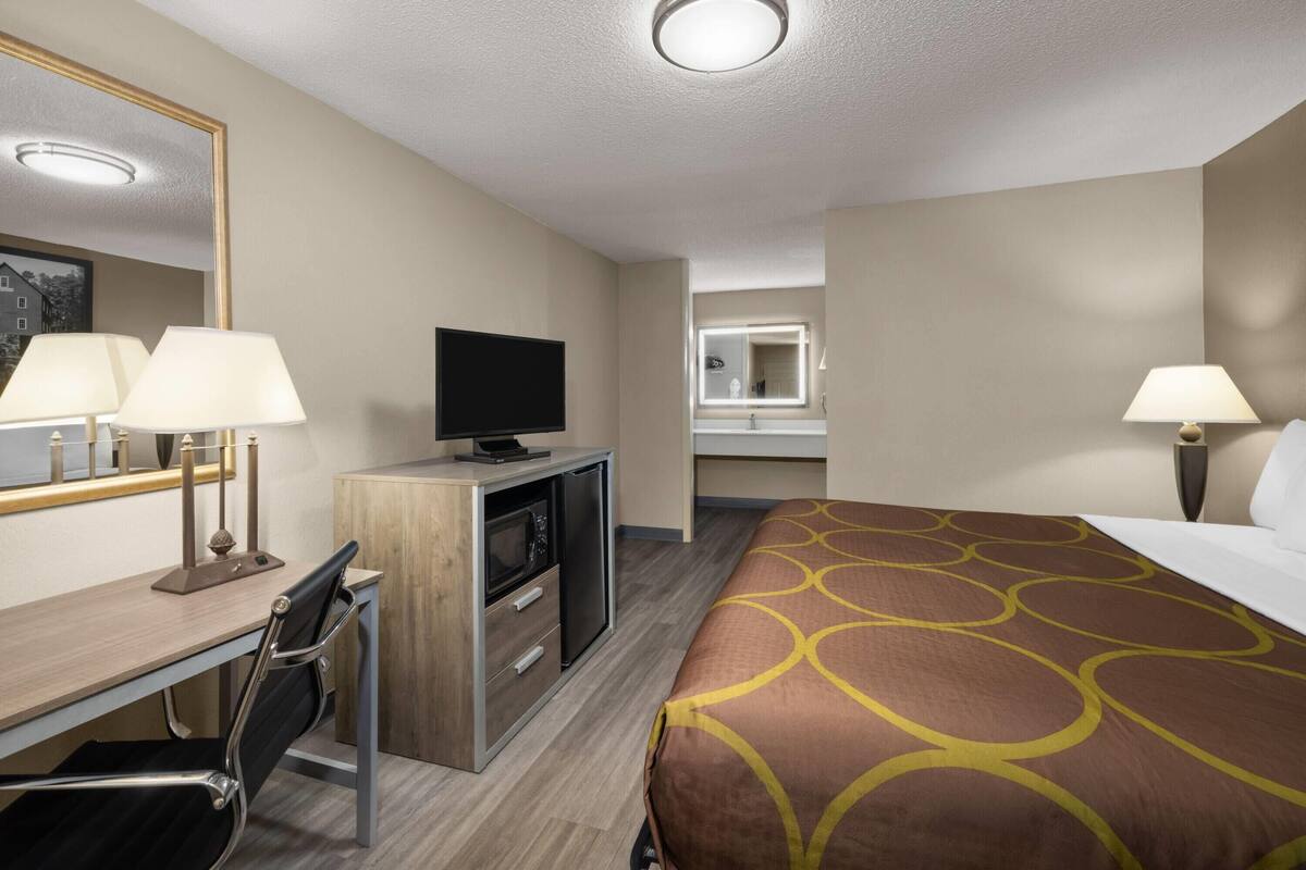 Desk, iron/ironing board, cribs (free), WiFi (free)