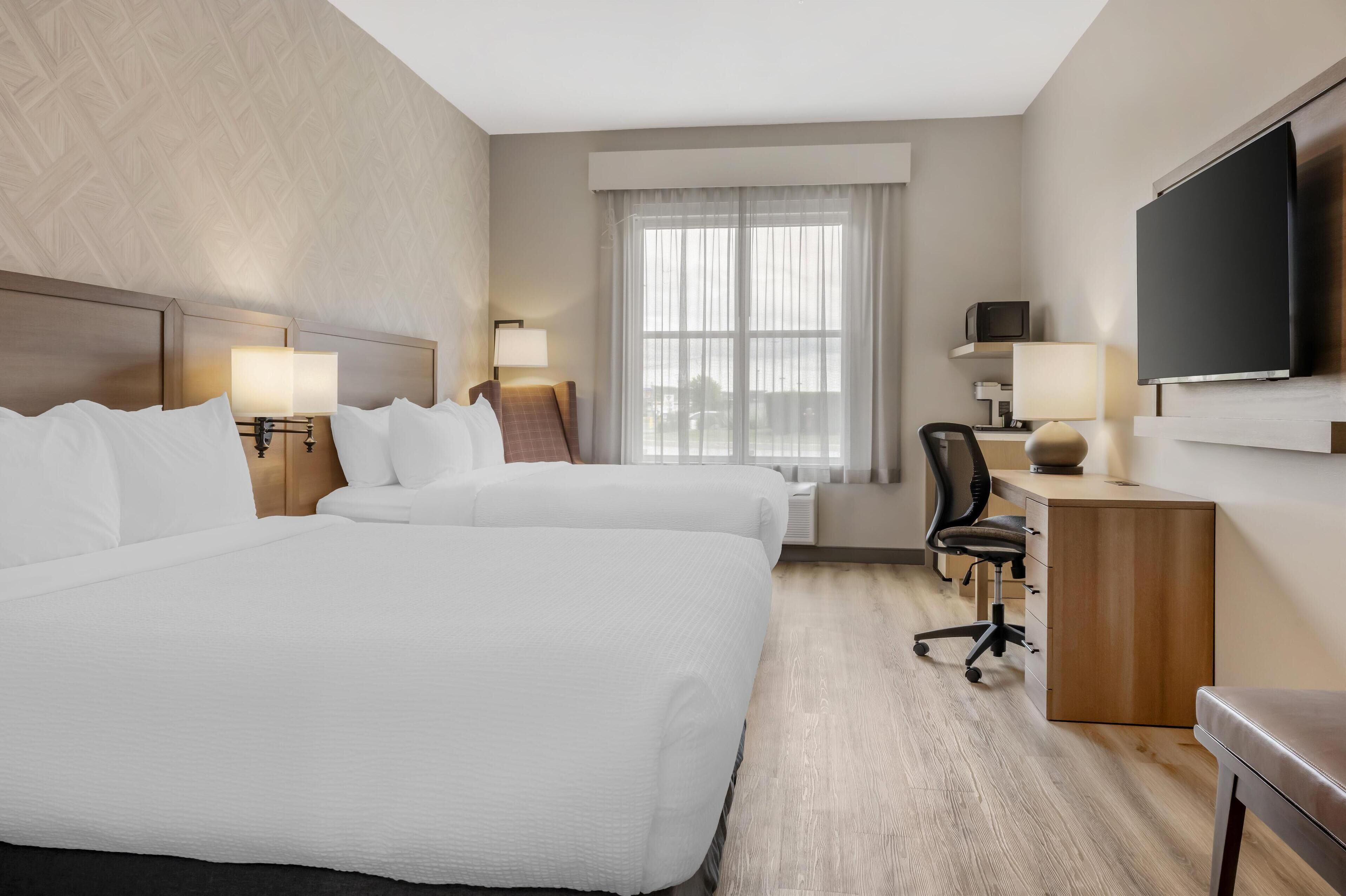 standard room, 2 queen beds, accessible, refrigerator & microwave | in-room safe, desk, iron/ironing board, free cots/infant beds