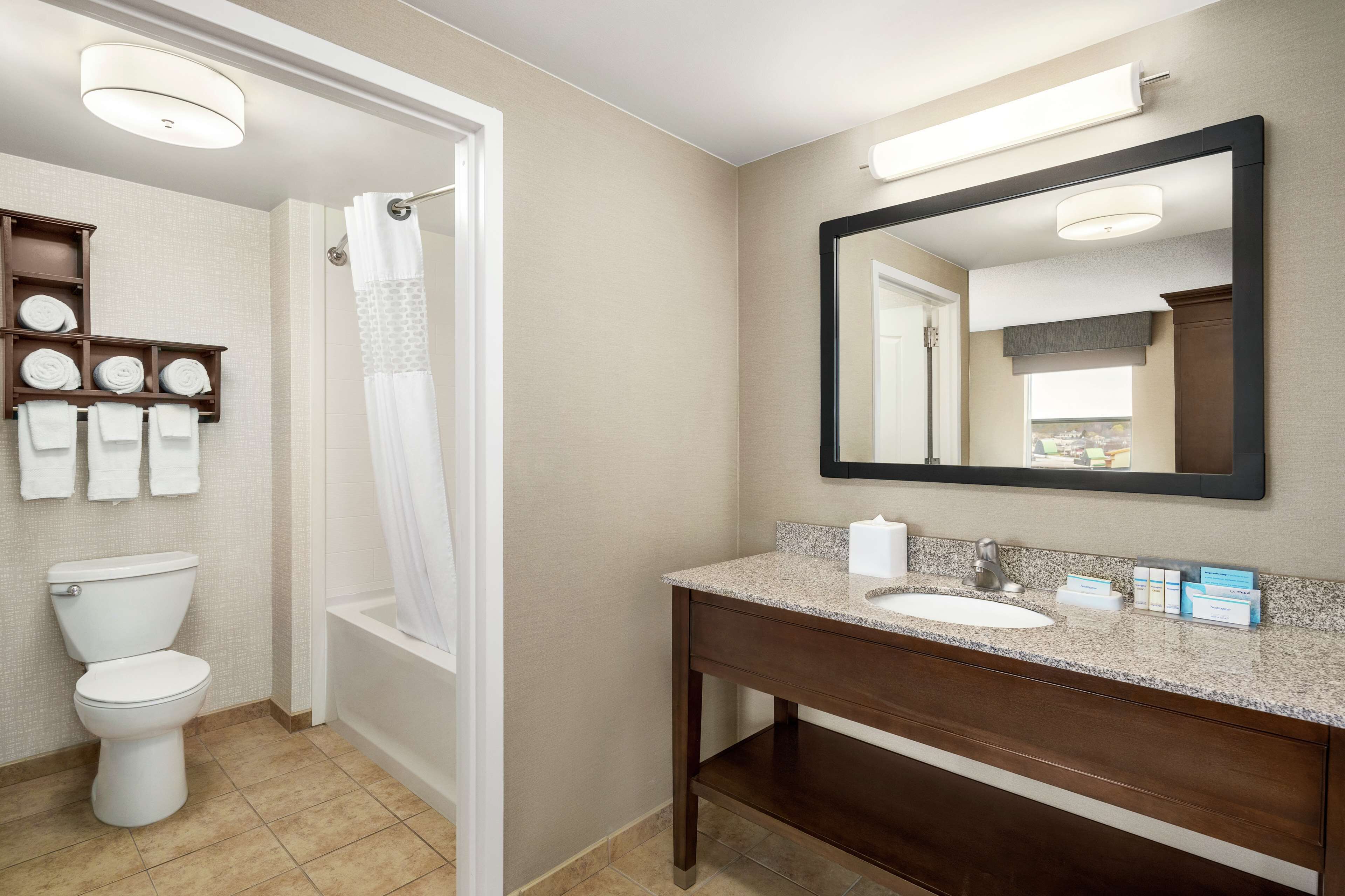 combined shower/bathtub, free toiletries, hair dryer, bathrobes