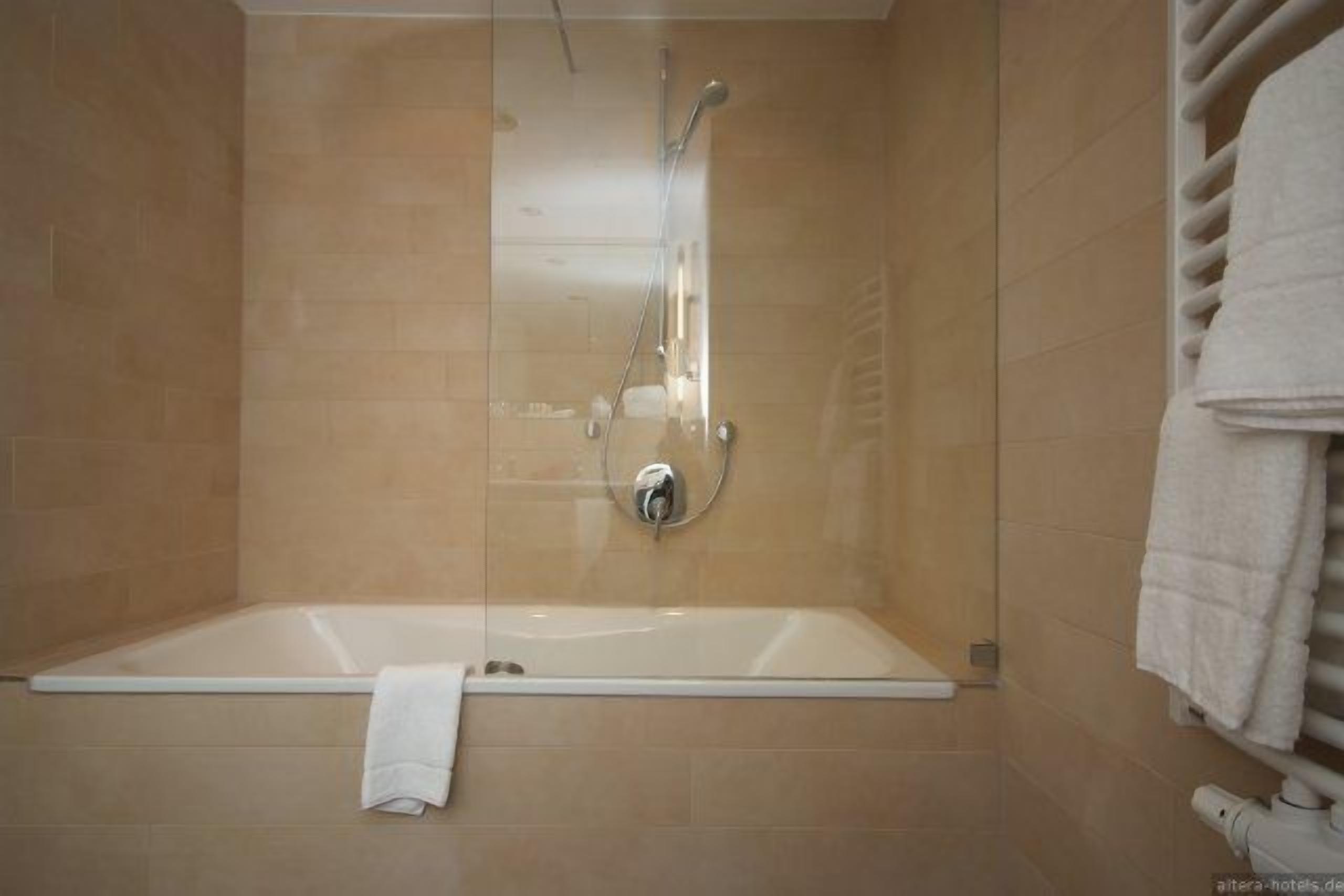 hair dryer, slippers, towels, soap