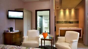 Junior Suite, Jetted Tub | Minibar, in-room safe, desk, soundproofing