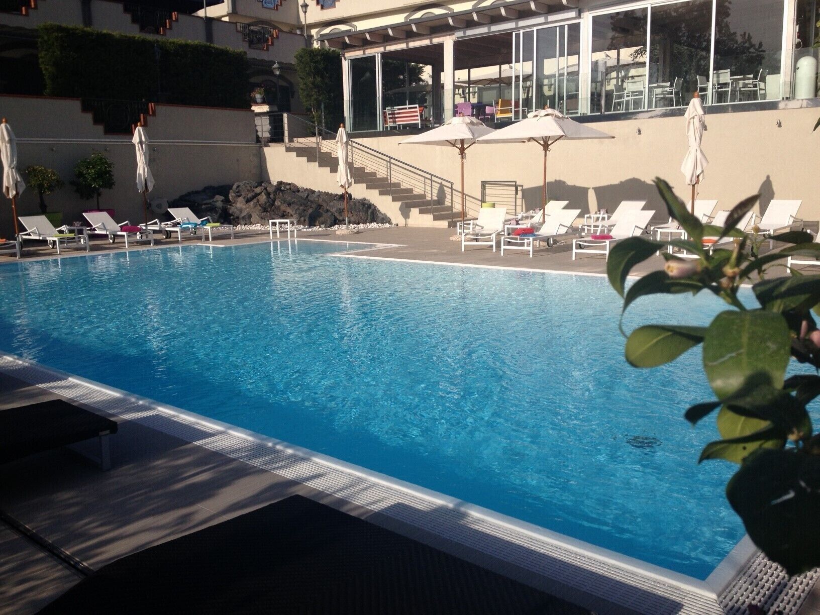 outdoor pool, open 9:30 am to 6:30 pm, pool loungers