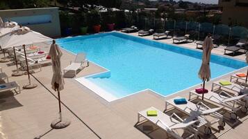 Outdoor pool, open 9:30 AM to 6:30 PM, sun loungers