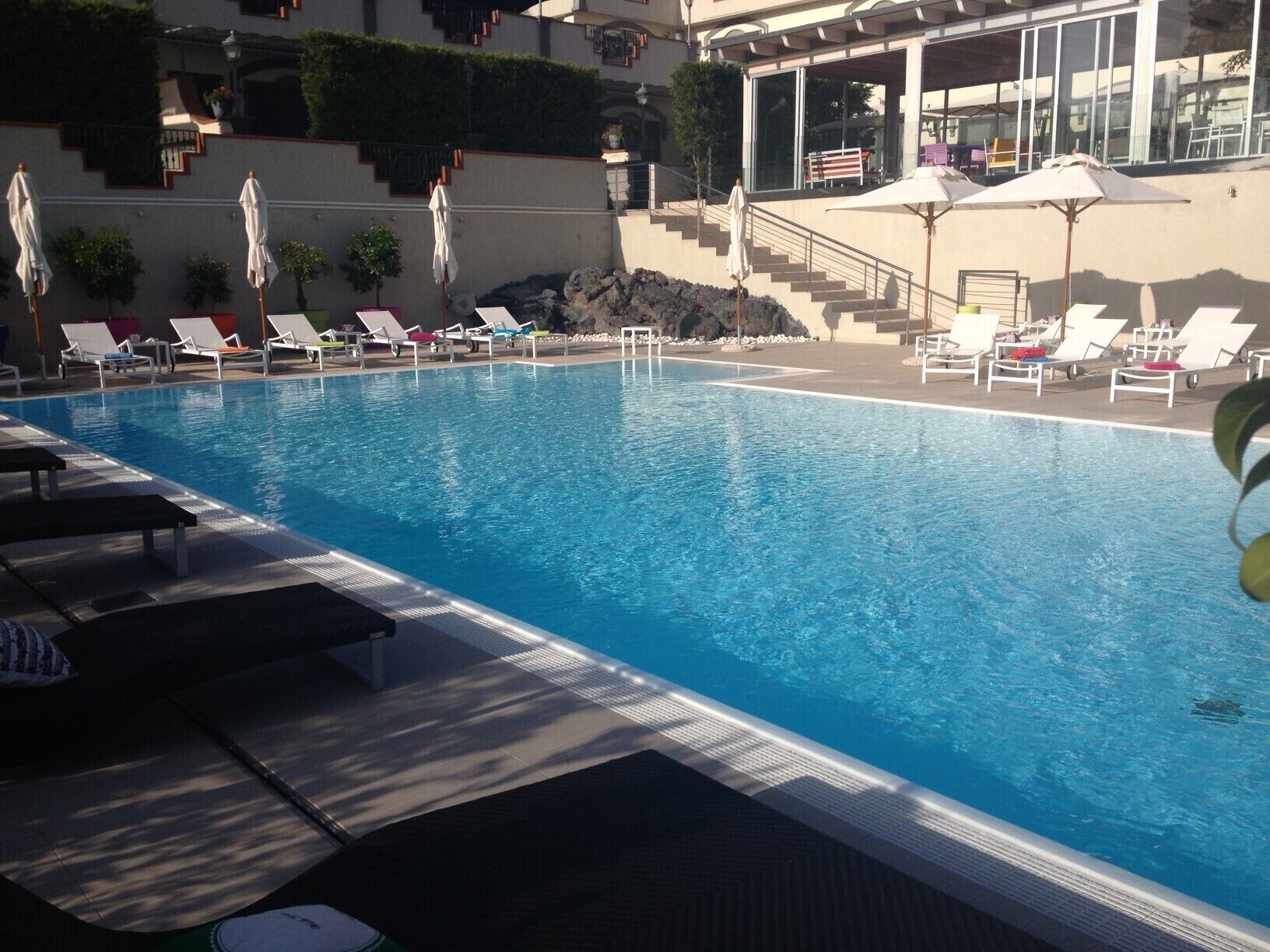 outdoor pool, open 9:30 am to 6:30 pm, pool loungers