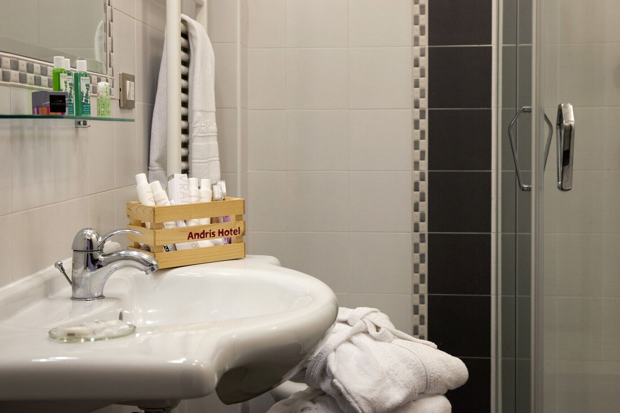 bathroom | hair dryer, towels