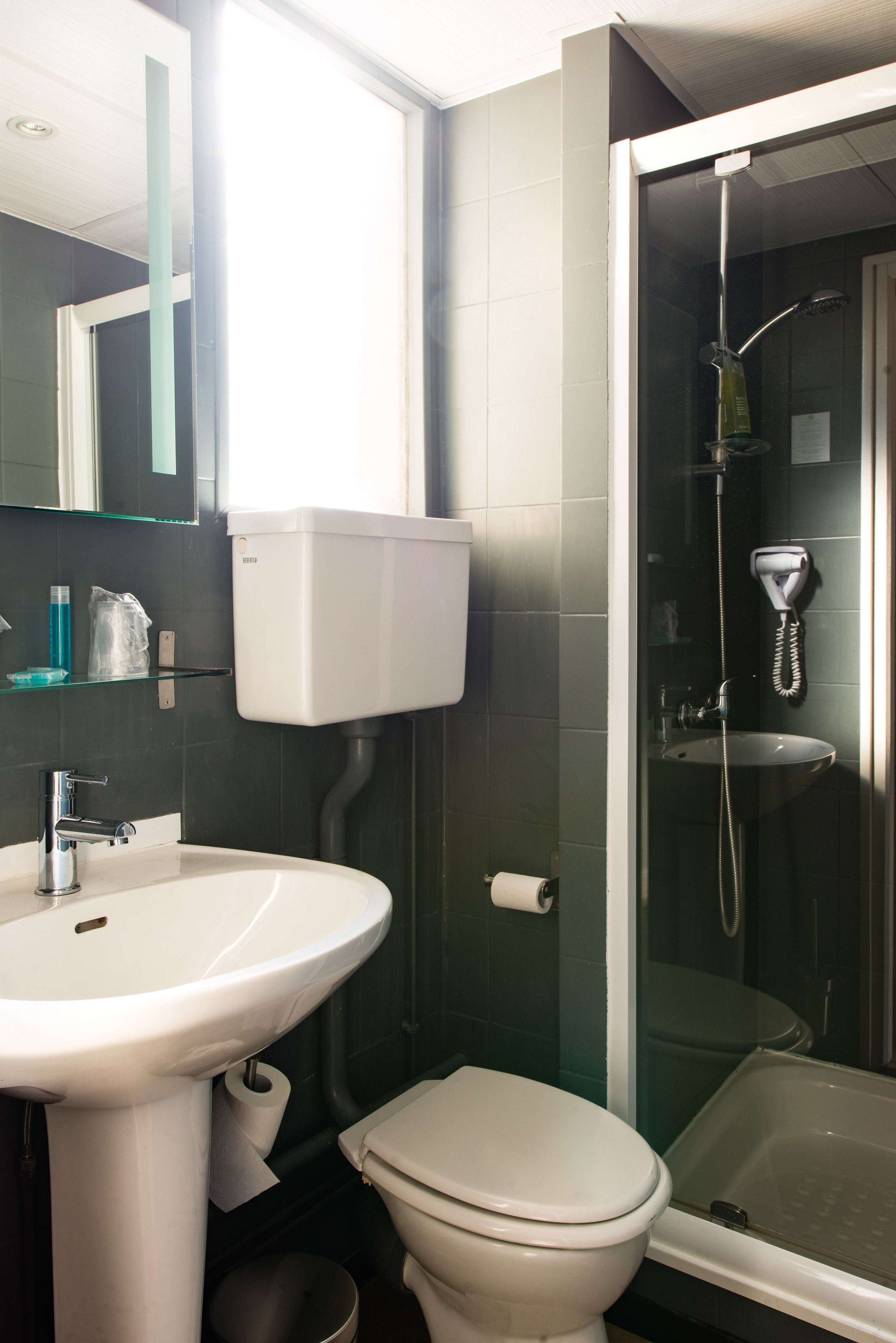 shower, free toiletries, hair dryer, towels