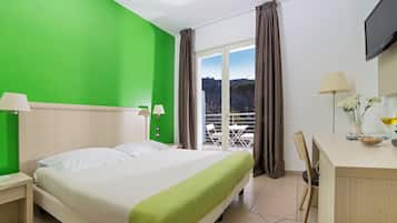 Double Room | Minibar, in-room safe, desk, iron/ironing board