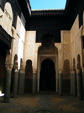 An interior courtyard with intricate tile work and arches. - The Repose (Salé)