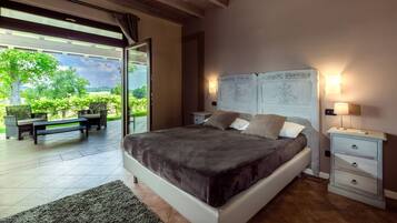 JUNIOR SUITE FAMILIARE CON 2 CAMERE DA LETTO | Lenzuola Frette, copriletto in piuma, con stile personalizzato