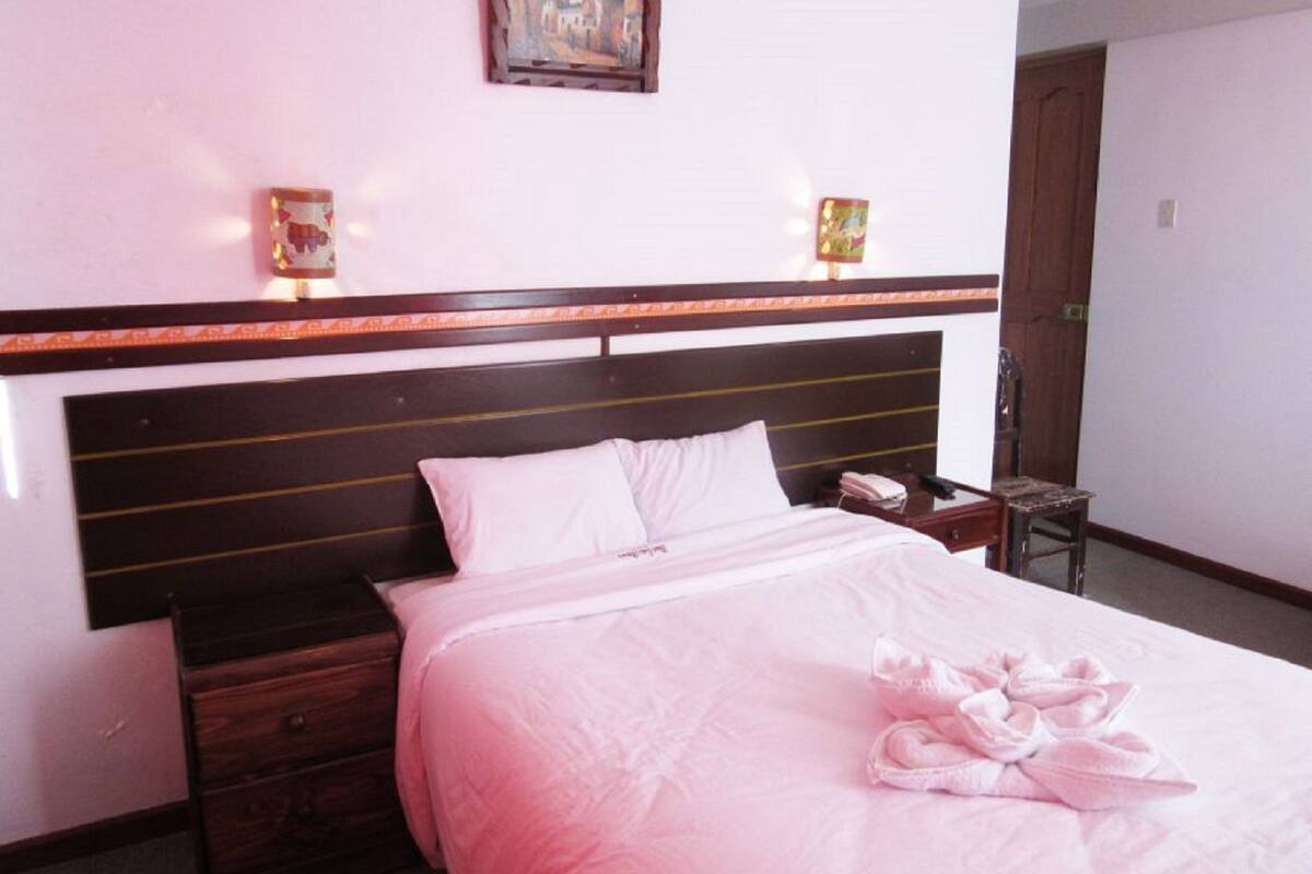 Single Room | Minibar, in-room safe, iron/ironing board