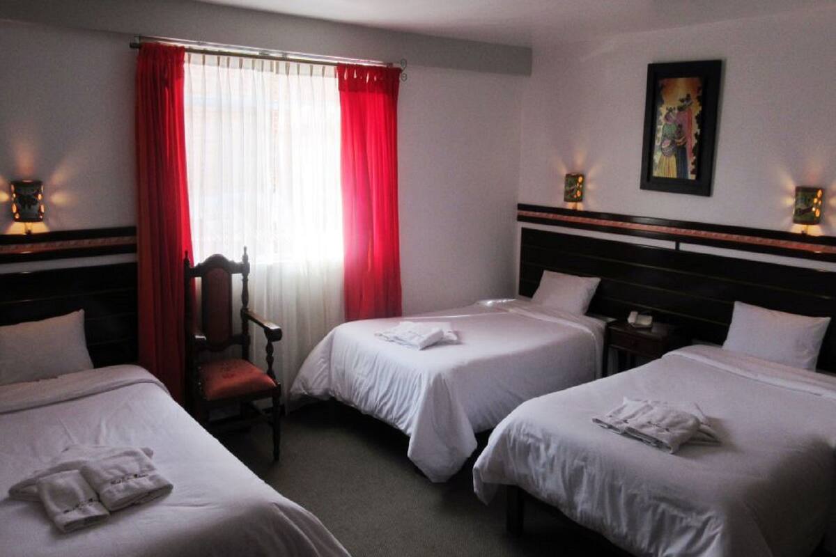 Triple Room | Minibar, in-room safe, iron/ironing board