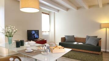 32-inch flat-screen TV with satellite channels, TV