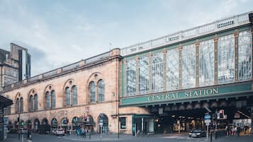 A historic building with the sign "Central Station" indicating a transportation hub.