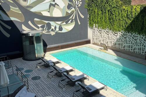 Seasonal outdoor pool, pool umbrellas, pool loungers