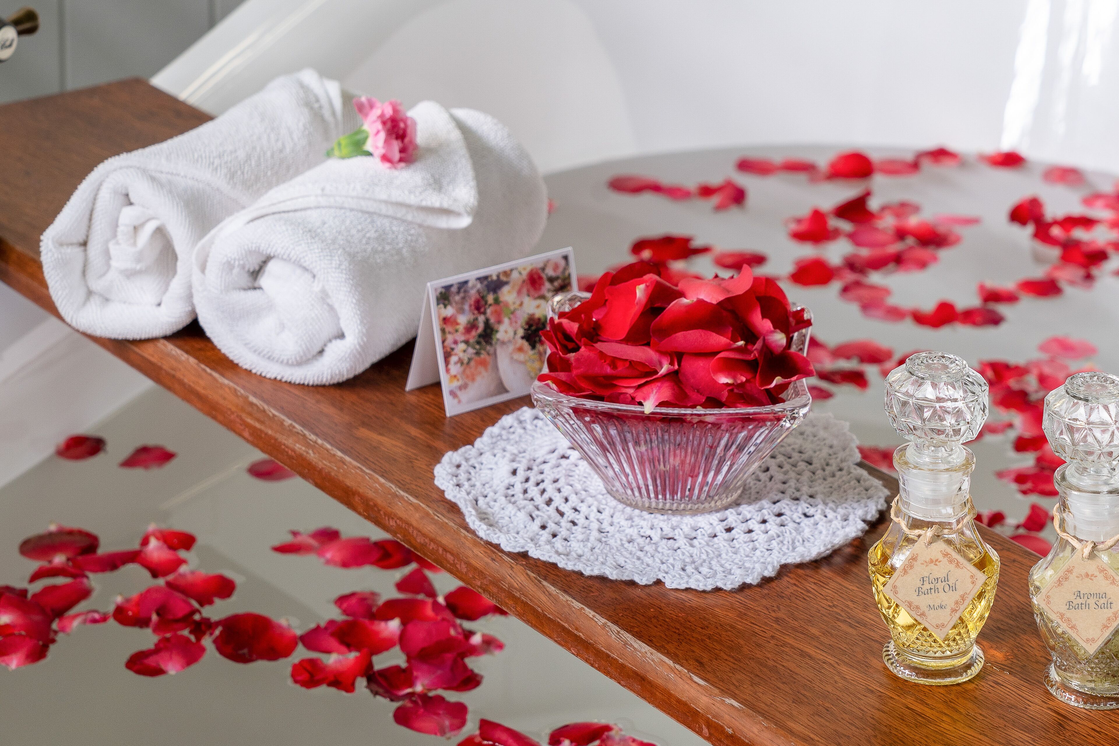 separate bathtub and shower, rainfall showerhead, designer toiletries