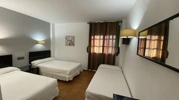 Triple Room | In-room safe, individually decorated, individually furnished, desk