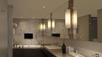 A modern bathroom with a large mirror, two sinks, a bathtub, and marble walls.
