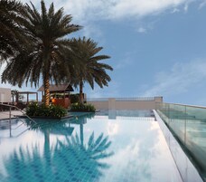 Outdoor pool, open 6 AM to 7 PM, sun loungers