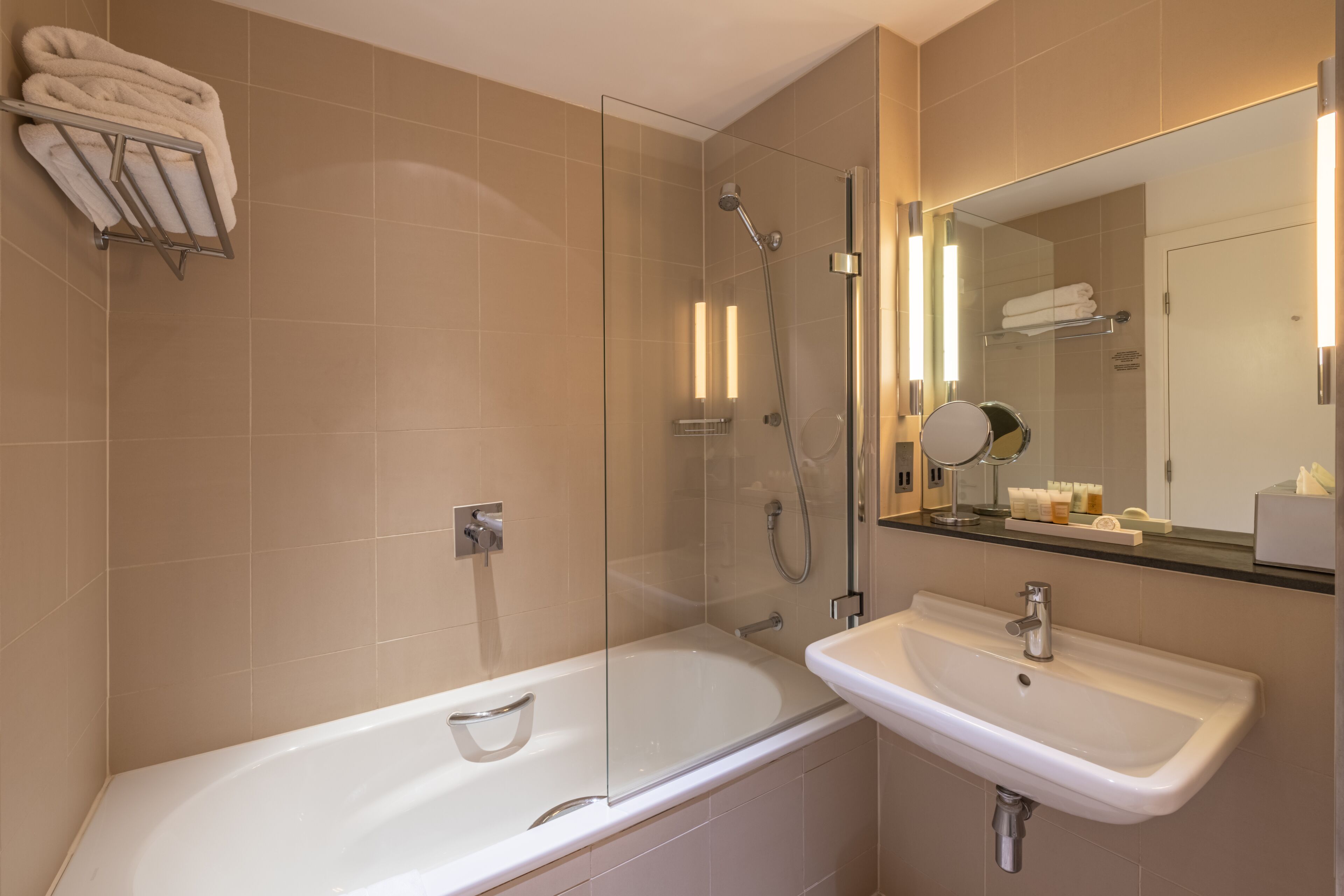 superior room | bathroom | designer toiletries, hair dryer, towels