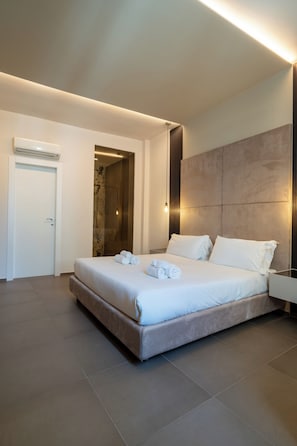 Suite Junior | Biancheria da letto di alta qualità, minibar, una scrivania