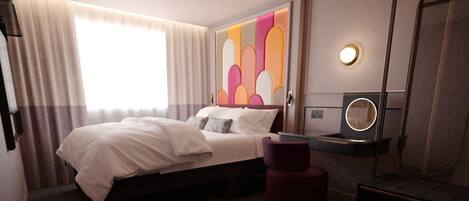 Luxe beddengoed, een kluis op de kamer, een bureau, een laptopwerkplek