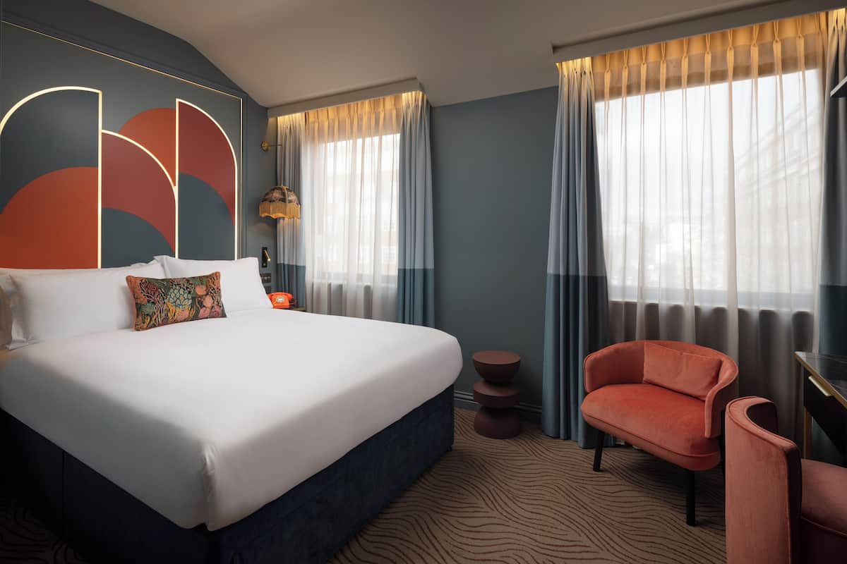 Queen Bedroom | Premium bedding, in-room safe, desk, laptop workspace