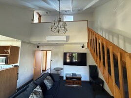 Premium Economy 3 Bedroom | Living area | 65-inch flat-screen TV with digital channels, TV, Netflix