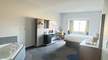 Deluxe Studio Suite, 1 Queen Bed, Non Smoking | Desk, blackout drapes, iron/ironing board, free cribs/infant beds