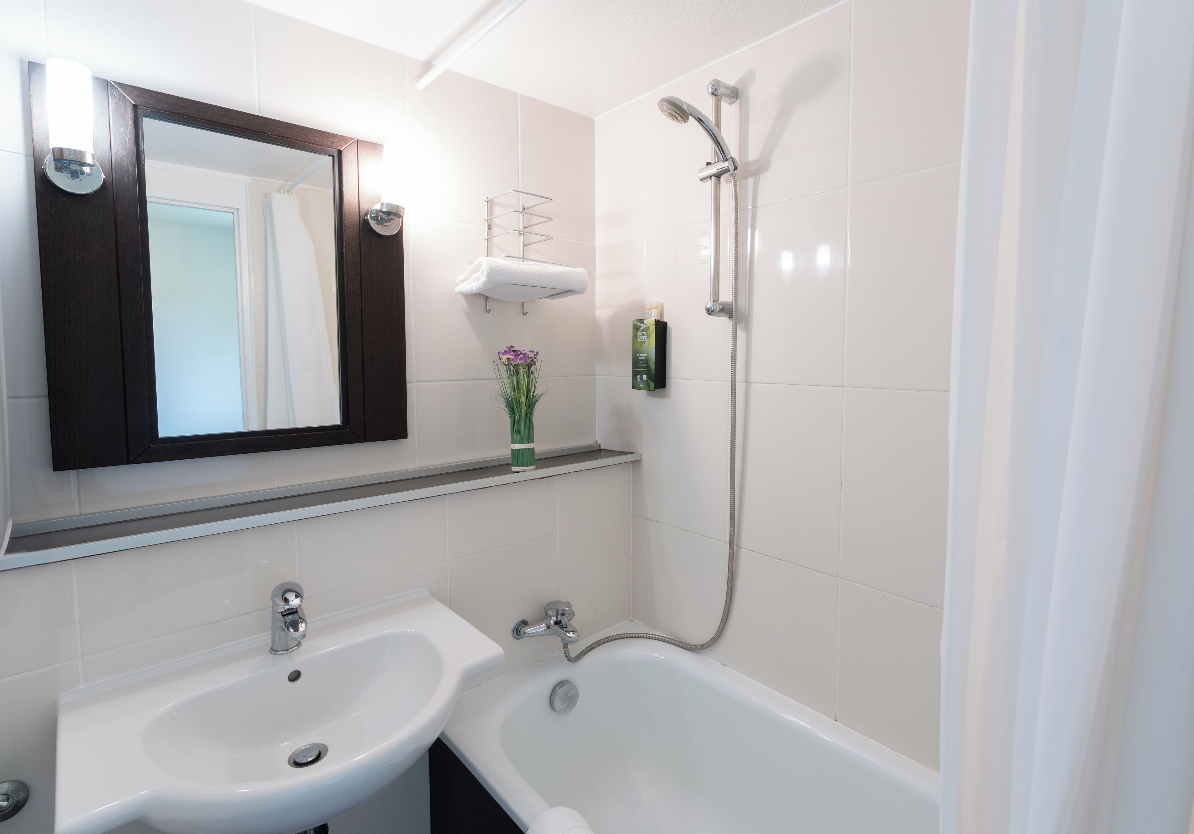 combined shower/bathtub, free toiletries, hair dryer, towels